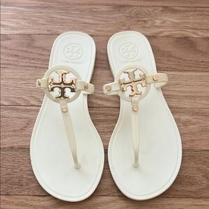 Tory Burch Cream Sandals with Gold Medallion